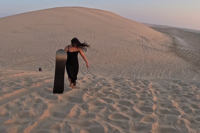 Half Day Night and Morning Desert Safari Camel and Sand Boarding - What the Driver and Guidance Looks Like in Real Life
