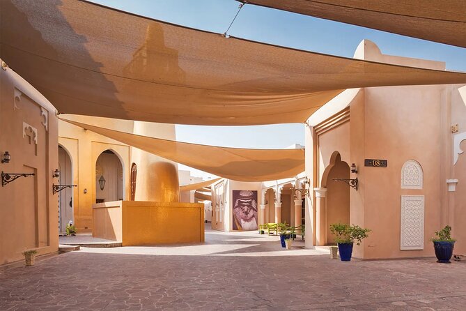 Half-Day Wonders of Doha: Culture, Skylines, Museums & Souqs - Stop 3: The Pearl Island, Riviera-Style Views, and Planned Luxury