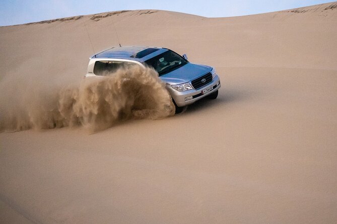 Private Half Day Desert Safari with Camel Ride - Stop 1 at Khor Al Udaid Beach: your first “desert meets sea” moment