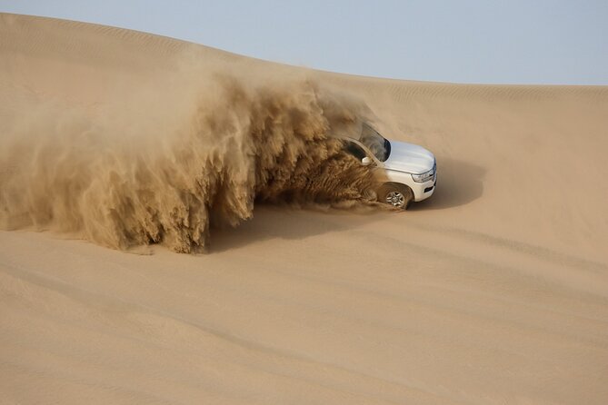Private Half Day Desert Safari with Camel Ride - Inland Sea time and the Al Rahal Resort break