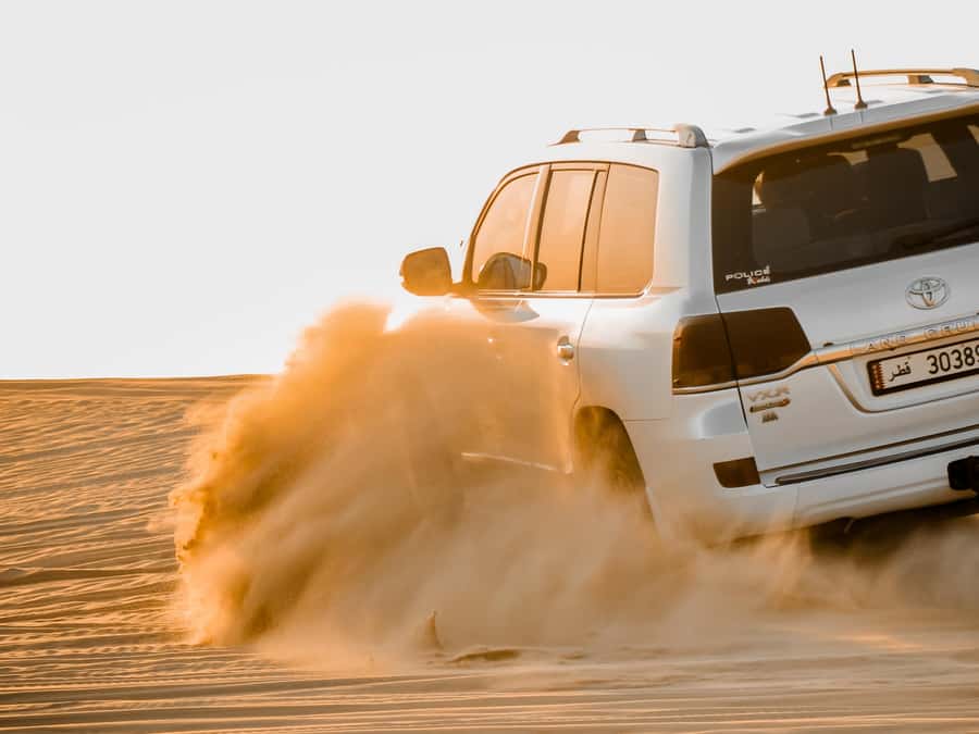 Qatar Desert Safari, Quad bike, Camel Ride and Sandboarding - How this 4-hour safari flows, from Doha to the dunes