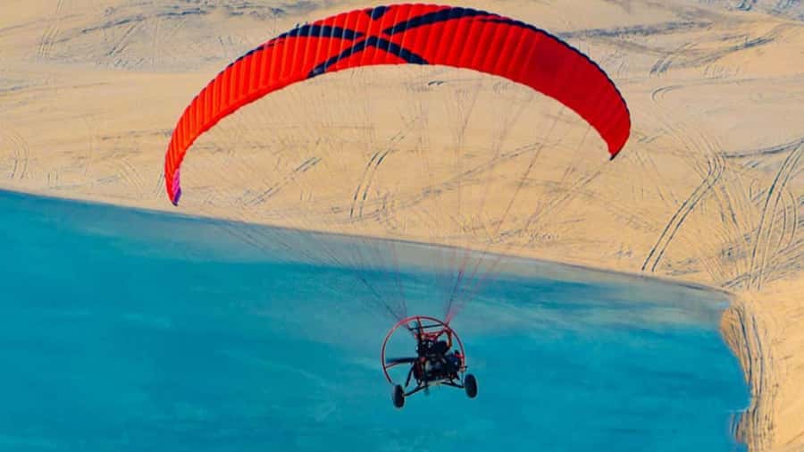 Qatar's Skybound Adventure: Exclusive Private Paratrike tour - Over the Desert Dunes: Golden Sands and Wide Open Air