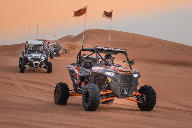 Qatar: Sunrise or Sunset Desert Tour in Doha, unforgettable trip - The second Inland Sea stop: sandboarding and the sunrise or sunset moment