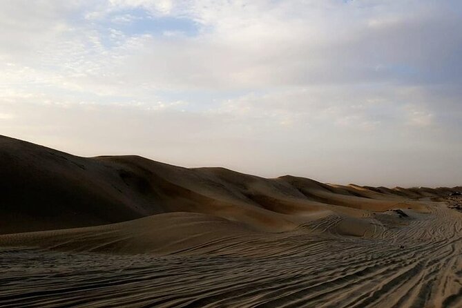 Qatar Sunset Desert Safari: Dune Bashing & Golden Sands Adventure - Sunset stops and the view game in Qatar desert
