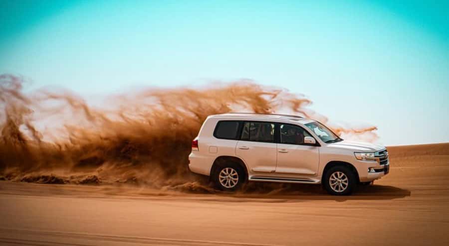 Relax Inland Sea Tour, Desert Safari, Camel Ride, SandBoard - Quad bike option: fun add-on, but treat it like a real driving activity