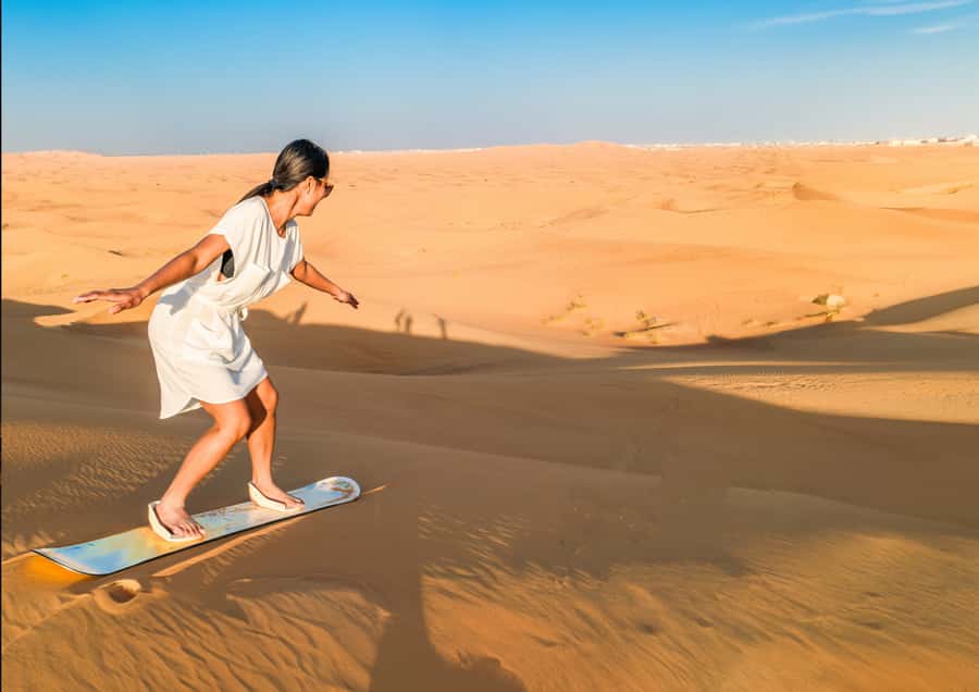Sunrise : Privare Dune Bashing, Camel Ride & Sandboarding - How Pickup From Doha Sets the Tone