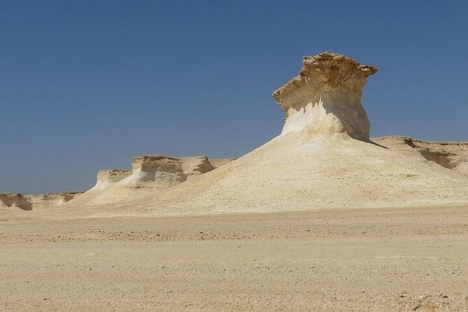 West Of Qatar Richard Serra sculpture, Mushroom Hills,Camel track - Why this West Doha route works: races, limestone, and steel