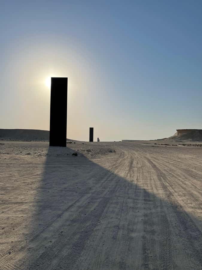 West Qatar tour to Richard Sierra sculpture,Umbrella Rock - The art break: what a great English guide actually adds